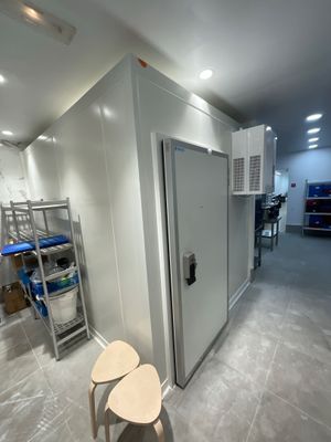 an image of a room with a toilet and a shower