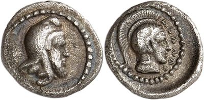 a silver coin with an image of a woman on it