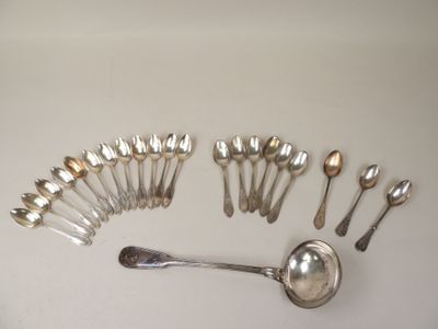 a lot of silver spoons and spoon spoons on a table