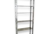a close up of a metal shelf with four shelves on each side