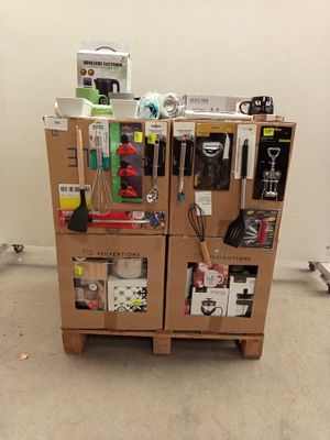 boxes are stacked on top of each other in a room