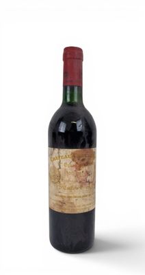 a bottle of wine that is sitting on a table