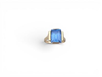 an image of a blue stone ring on a white background