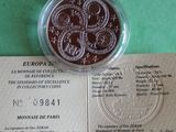 a picture of a commemorative coin on a piece of paper