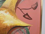 a painting of a woman ' s face on a pink background