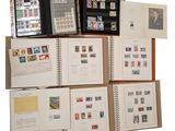 many different types of stamps on the pages of a book