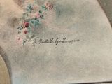 a picture of a painting of a woman with flowers on it