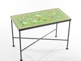 an image of a small table with a green and red tile top
