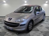 a picture of a silver car parked in a showroom