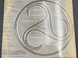 the cover of an album with a picture of a snake on it