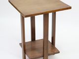 an image of a small wooden table with a shelf underneath it