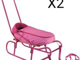a pink baby stroller with a pink seat on it