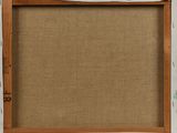 a close up of a picture frame on a wall with a brown background
