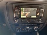a radio in the center of a car that is being used