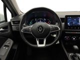 the interior of a car with a steering wheel, dashboard, and dash board