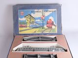 a box with a train set in it on a table