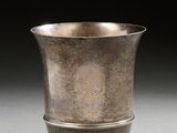 an image of a silver cup sitting on top of a table