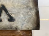 a close up of a clock with a roman numeral on it