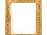 an antique gold frame with a white background and a white background