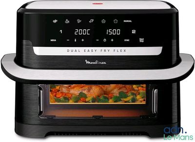 an image of a black and white oven with food inside of it