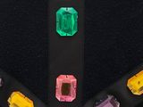 a close up of a car seat belt with colorful buttons on it