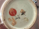 a cup with a picture of a man and a woman on it