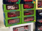 many different types of toy vehicles in the boxes