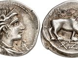 a silver coin with an image of a lion on it
