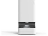 a close up of a white air purifier on a white surface