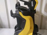 a close up of a yellow and black pressurer on a table