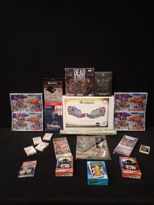 le contenu d'un jeu est disposé sur une table noire