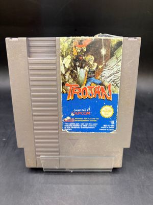 une vieille cartouche de jeu Nintendo sur laquelle figure l'image d'un homme à cheval