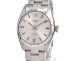 a close up of a wrist watch on a white background