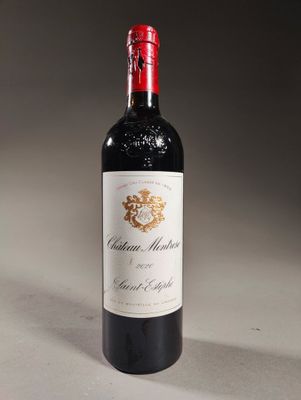 a bottle of wine that is sitting on a table