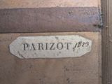 a picture of a plaque on the side of a building that says parizot