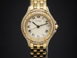 une montre-bracelet en or jaune 18 carats sertie de diamants