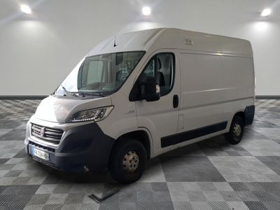 a picture of a white van parked in a room