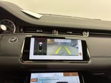 the dashboard of a car with a gps device in the center