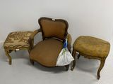 two chairs and a foot stool in the corner of a room