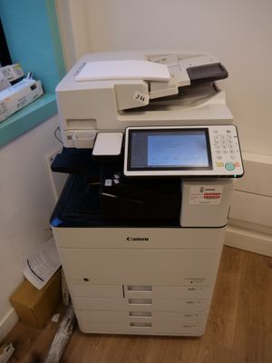 a printer that is sitting on top of a printer