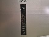 an image of a stainless steel refrigerator with the words haiier on it