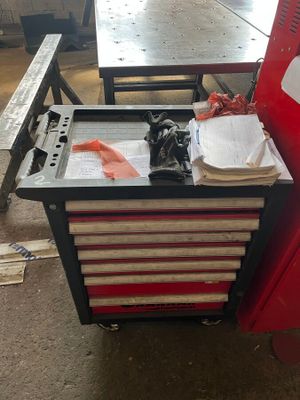 an image of a work bench with a tool box on it