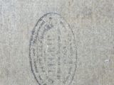 a picture of a close up of a piece of paper with a stamp on it