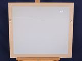 an easel with a white board on a blue background