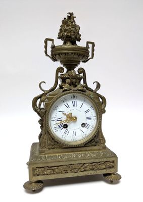 a clock that is sitting on top of a table