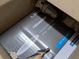 a cardboard box with a book inside of it