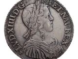 a close up of a coin on a white background