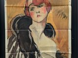une vieille affiche représentant une femme aux cheveux roux, dans un cadre noir