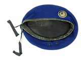 a blue hat with a black patch on it