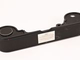 an image of a close up of a black object on a white surface